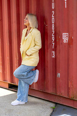 A Lovely Blonde Model Poses Outdoor While Enjoying The Spring Weather