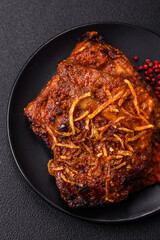 Delicious pork or beef ribs baked on the grill with salt, spices and herbs