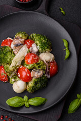 Delicious fresh juicy salad with quail eggs, cherry tomatoes, lettuce leaves