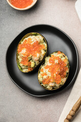 Avocado Cups Stuffed with Tasty Mexican Prawn and  red caviar