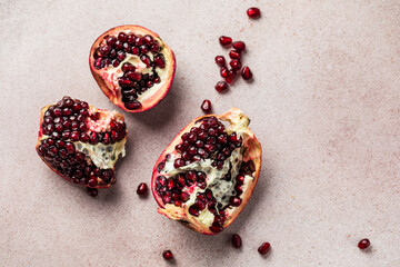 Pieces and grains of ripe pomegranate. Pomegranate seeds.