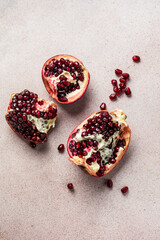 Pieces and grains of ripe pomegranate. Pomegranate seeds.