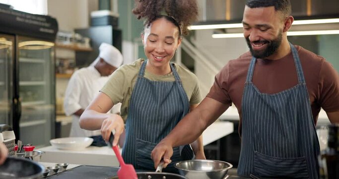 Couple, happy and cooking for professional class, pan and saute ingredients for meal together. Smile, speaking and check, learning and culinary education or teamwork, kitchen and date for bonding