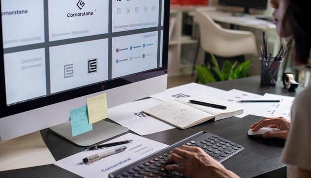 Asian Graphic designer working in office. Designing logo Artist Creative Designer Illustrator Graphic Skill Concept.