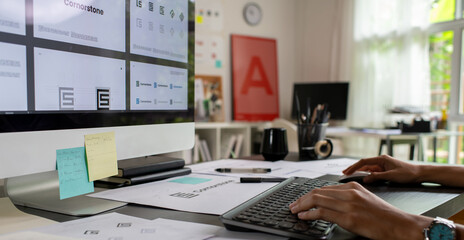 Asian Graphic designer working in office. Designing logo Artist Creative Designer Illustrator Graphic Skill Concept.