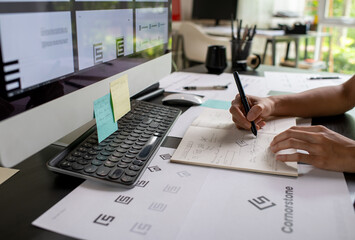 Asian Graphic designer working in office. Designing logo Artist Creative Designer Illustrator...