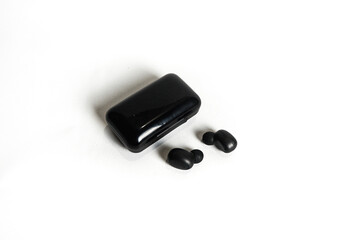 photography of a wireless bluetooth headset