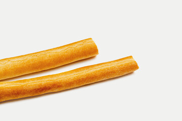 Italian grissini bread, traditional breadsticks isolated on white background, full depth of field.