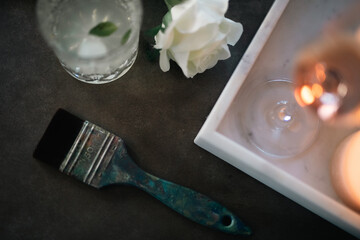 still life with candle and flowers