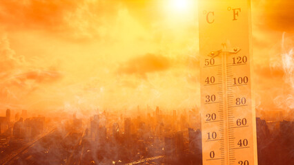 city hot temperature ,Thermometer on yellow sky with sun shining in summer show higher Weather, concept global warming