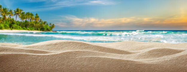 Obraz premium Serene Beach Landscape with Waves Gently Caressing the Shoreline. Pristine sands meet the azure waters under a tranquil tropical sky. Panorama with copy space.