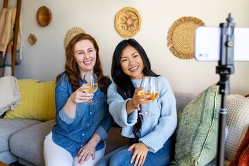 Virtual party in the new normal, roommates cheering with wine