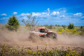 Fototapeta premium Hard ride UTV on sandy road. 4x4, extreme, adrenalin.