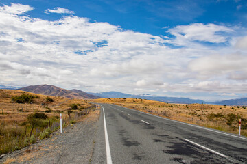 the highway in south island new zealand. the backgroud is southern alps mountains. 