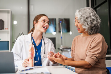 Caucasian woman and elderly Asian woman discuss health issues cold, influenza, pneumonia, bronchitis, stomach disease, GERD, IBS, inflammatory bowel disease, gallstones, chronic constipation