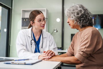 Caucasian female psychiatrist sits at her desk, providing mental health consultations and therapy...