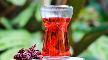 a glass of roselle tea. herbal drink for health
