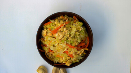 scrambled eggs with carrots and cabbage in a bowl or orak arik 