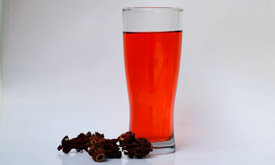 a glass of roselle tea. herbal drink for health