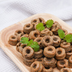 Ring-Shaped Donut  Dog Treats on Wooden Serving Plate