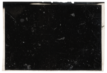 Vintage photo slider, black background with dusts and scratches, with semi-transparent egde of the film on transparent background with space for text.