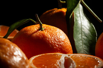 tangerine on black background macro closeup