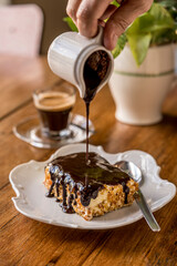 almond with chocolate falling and coffee ready to eat