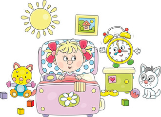 Cute little girl awaking up in her pretty small bed among toys after merry rings of a funny alarm clock in a nursery room on a sunny morning, vector cartoon illustration isolated on a white background