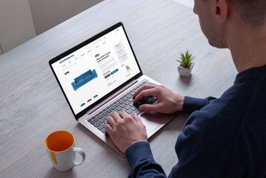 Purchase furniture online from ecommerce website. Illustrating the concept of searching for sofa couch with armrest conveniently through digital platform