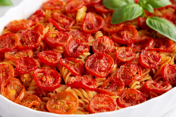 Homemade Easy Tomato Basil Pasta Bake, side view. Close-up.