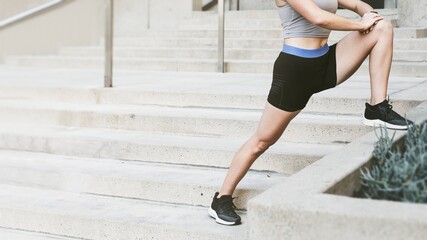 Woman stretching during her morning exercise