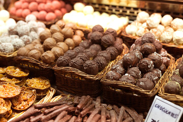 Chocolate truffle balls on market counter