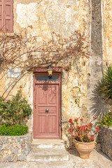Old wooden brown door in Rethymnon. Greece.