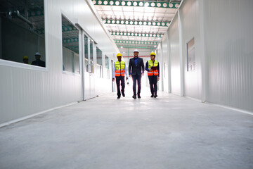 Fototapeta premium Engineers and employees work in industrial plants.