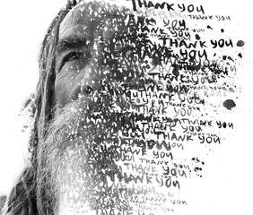 A conceptual double exposure paintography portrait of an old bearded man