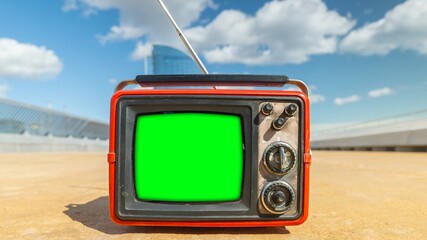 televisions with green screen next to the sea, to add your own content onto the tvs