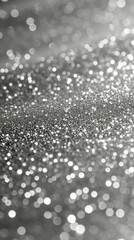 Silver glitter background with shiny sparkles