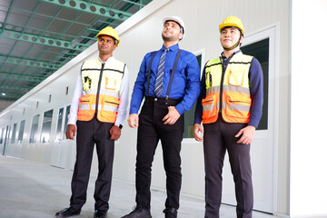 Engineers and employees work in industrial plants.