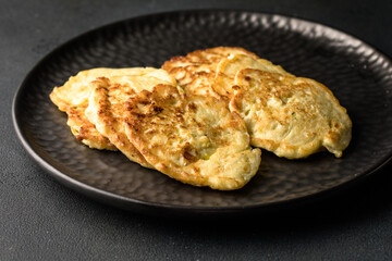 Vegetarian Quinoa fritters with zucchini garlic.