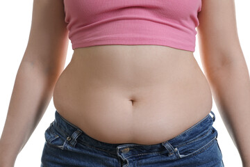 Fototapeta premium Woman with excessive belly fat on white background, closeup. Overweight problem