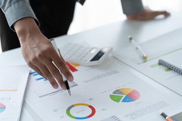 close-up hands image, Professional Asian male and female financial consultant or analyst working...