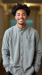 Portrait of a smiling young man with afro hair