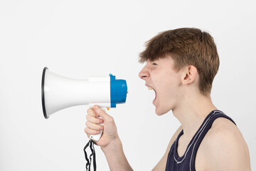 Fototapeta premium A teenage protester with a megaphone