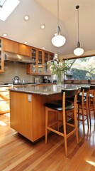 Kitchen island with wood cabinets and a breakfast bar