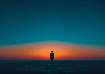 Fototapeta premium Lonely Man Silhouette at Sunset