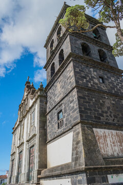 Perspective of the bell tower and the facade of the church of Our lady of Estrela in Ribeira Grande, São Miguel - Azores PORTUGAL