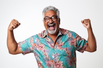 Portrait of a cheerful indian man in his 50s donning a trendy cropped top in white background