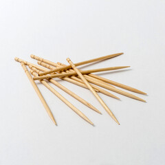 Group of wooden sticks turning on white background