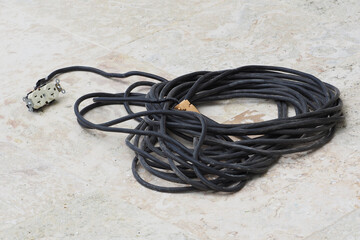 Heavy gauge electrical extension cord on construction site. Diy,