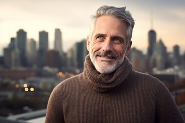 Fototapeta premium Portrait of a blissful man in his 50s dressed in a warm wool sweater over vibrant city skyline